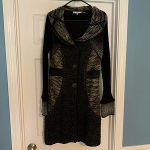 Long button up sweater.